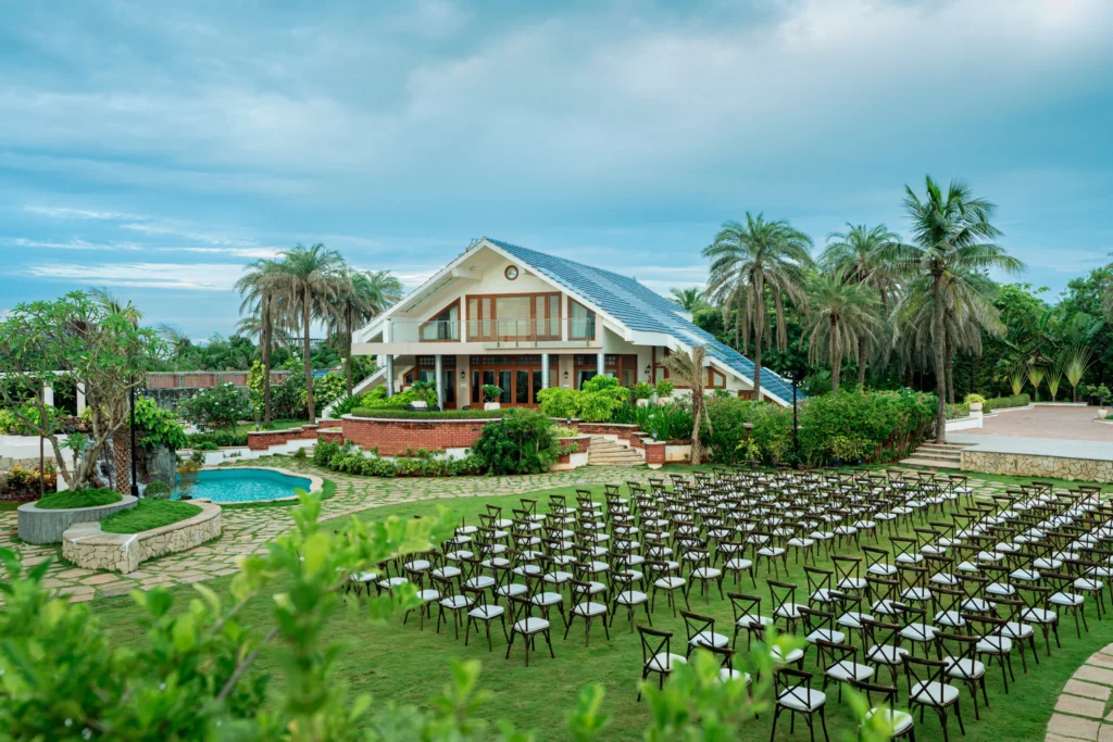 Elegant floral wedding aisle with mirrored walkway and luxury event décor