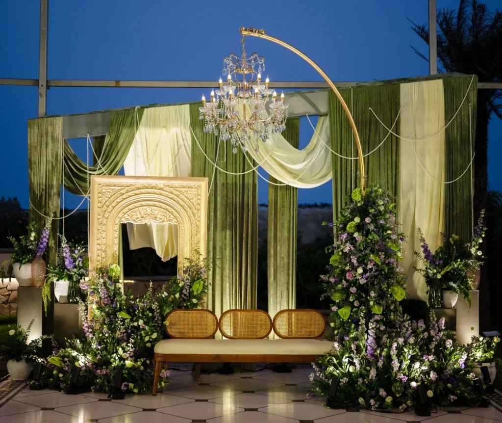 Haldi ceremony setup with elegant floral decor and traditional event styling"